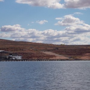 Halls Crossing Boat Ramp 11-11-10. We had 1 inch of snow on the ground when we left Durango Thursday morning. Roads were dry when we reached Utah. Partly sunny when we arrived at Lake Powell around noon. Sunny on Friday and Saturday. Started to cloud up a little on Sunday when we left around 1:00PM. Temperatures ranged from a high of 55 during the day and a low of 37 during the night. Could not of had better weather for this time of year at Lake Powell. We saw no more then six other boats each day.