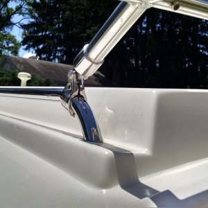 All SS hardware, and just 1 clamp to roof rail on each side.