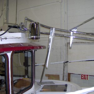 mast tilting forward. It can now be put up standing on the front deck