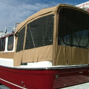 Now they will cut some canvas off the back end to vent holding tank vent outside instead of the cockpit.