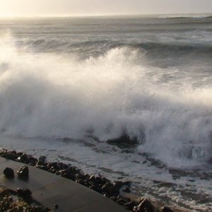 Surf up and over the jetty