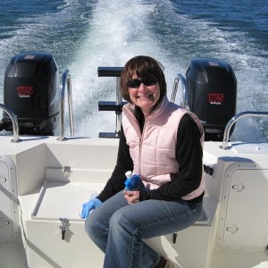Linda in the cockpit as we cruise out into the gulf.  Amazingly calm day :-)