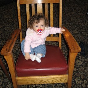 Lili waiting for her Suzuki motor to be fixed.  By the time its fixed she might fit into this chair.