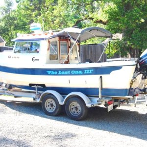 Been some changes since she came home (photo 3) June 2010
Black tape on sides mark the approx. locations of the 20" legal sturgeon slot for CA from back of boat.