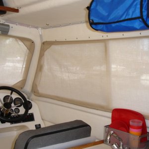 New sunbrella shade window coverings. Allow light and some view but lots of privacy.
