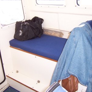 Bench seat with storage underneath.