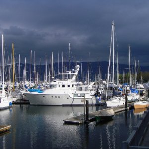 White boat and dark sky, John Wayne Marina