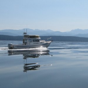 JC Lately on a glass flat Juan de Fuca. Some days are like this, but some are not.  One of my favorite C-Dory pix.  I'm a fan of a good monotone sometimes.