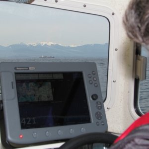 #10 Freighter on Radar 2009 122 Olympic mountains in the background.
