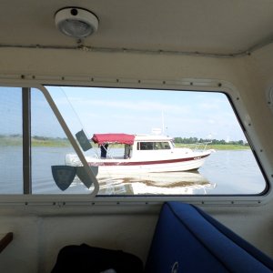 Freedom from underway next to Delfin