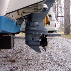 Permatrim foil. Not much drag at level trim. Holds water around prop for less cavitation. Turned down edges help with tracking.