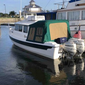 Plastic windows out, added screens, and window curtains.