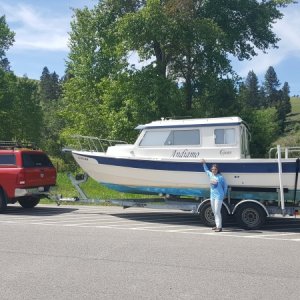 Dana in Wyoming with Andiamo on the way home from her purchase in South Dakota June 2018. Prior to 15 she had been a New England boat. We traded the 03 135 Honda for new Suzukis at Sportcraft in Oregon.