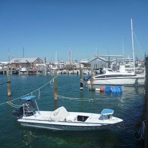 The dinghy dock in the rear of the photo Key West Harbor near Turtle Kralls Restaurant