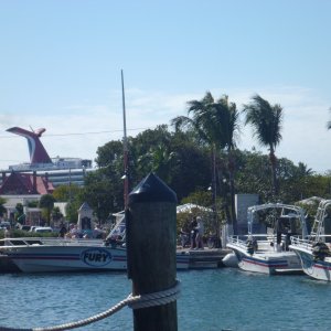 The Para sailing fleet, notice the stack on the cruise ship in the upper backround. The cruise ship must leave before sunset as they would block the view of the sunset from Mallory Pier a daily obsession for some.