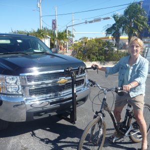 We put a front mounted trailer hitch so we could carry two bikes on the front of the truck with an existing bike rack we already had.