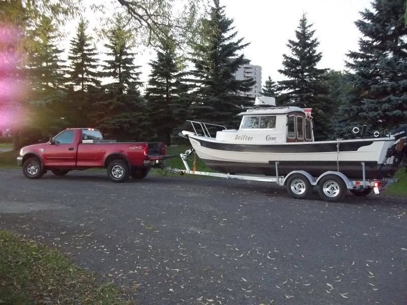 04/10/2010 Pulled my boat for the season while the weather is warm enough to do some bottom painting. Tomorrow i will put the front trailer jack on a bathroom scale to check the tounge weight.I think the axiles need to be moved forward about six inches.There seems to be more weight on the forward tires.