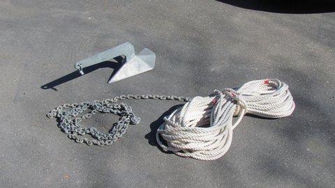 14 Pound Lewmar like anchor with 15' of 1/4" chain and 175' 3 strand nylon rode.