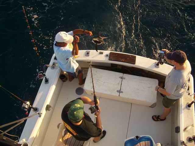20061023 - 09 1st Mexico Cruise - The guys fishing while the ladies swam with Dolphins