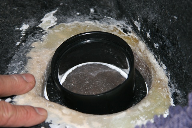after feathering it out some to fit the housing perfectly, silicon was recommended to seal, before filling the outer cavity with glass and resin...