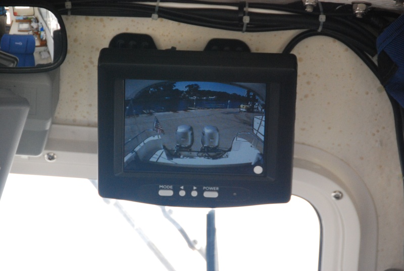 AFTER  getting the original monitor wet from spray thru the center windshield,(I left the protective plactic cover off)it was time to move it to a drier location to the right of the C80's Alphanumeric Keypad -above the windshield.
The replacement came from 'RVCams.com'.