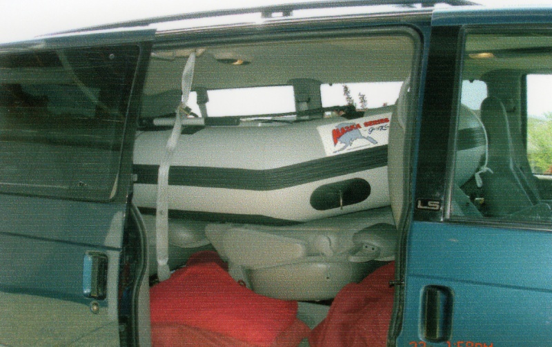 April 2006: Side view of dinghy inside the Astro Van.  Works great for just a trip to the lake or the marina.