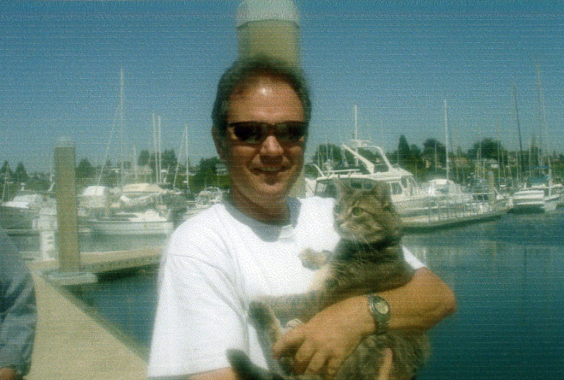 Aug 2006 - Bellingham 
   Jim & Molly aka 
the C-Brat Boat Cat 
     WILD BLUE