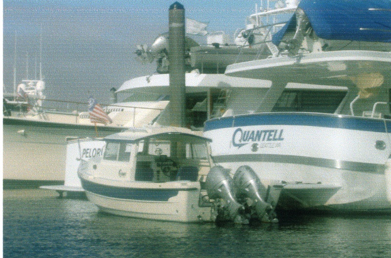 Aug 2006 Roche Harbor 
19CD tied up to the stern
 of a very nice yacht.