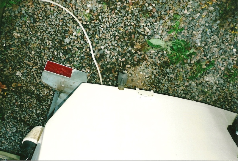 Boat Transom Drain Plug..exterior view.Think i will remove these and just put in a regular Brass T Handle  Plug on the inside. Oct.17/09