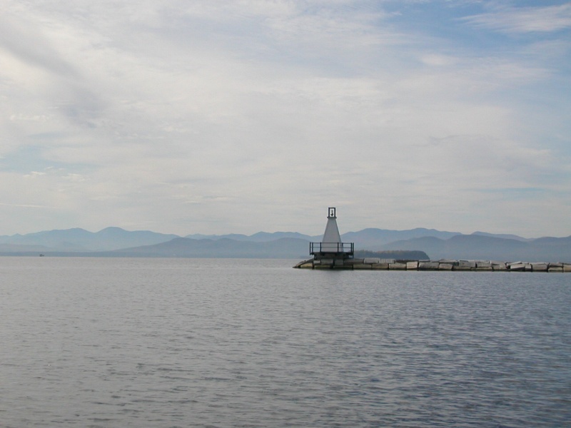 Burlington breakwater with Adirondack mountains in background
