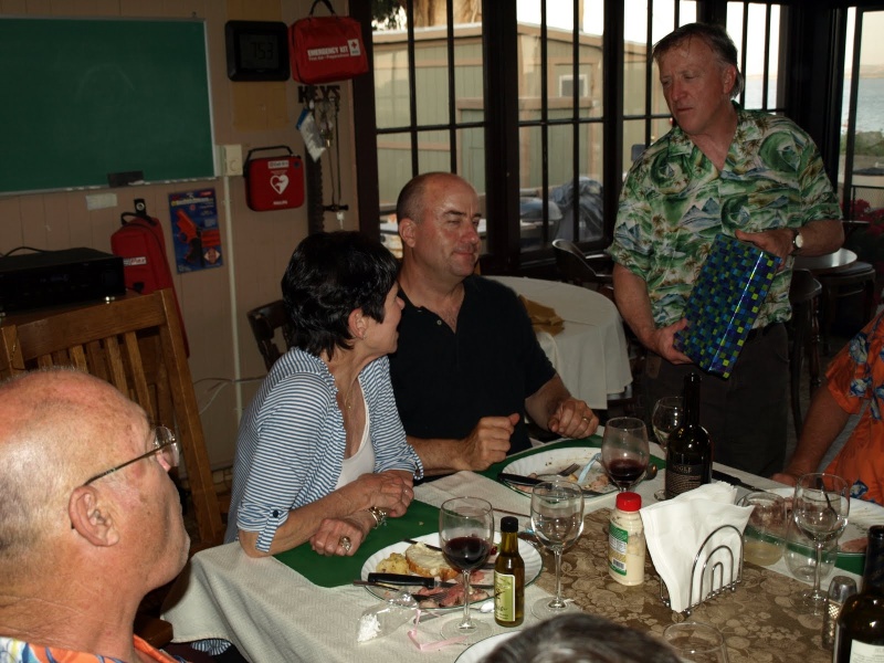Captain Jim presents an award to John and Robin (Dinner Belle II) who also hosted the Duck Club dinner. Are they great hosts or what?