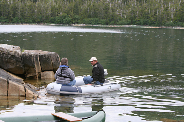 Caroline and Mark return to the beach after retrieving more goodies for the gathering.
