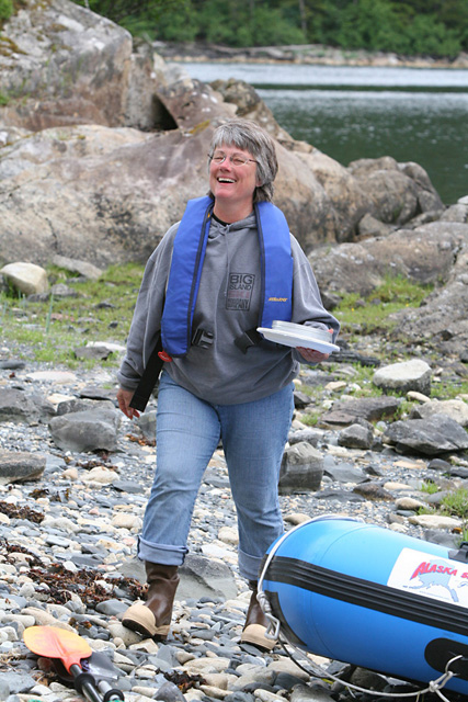 Caroline returns to the gathering with an offering.