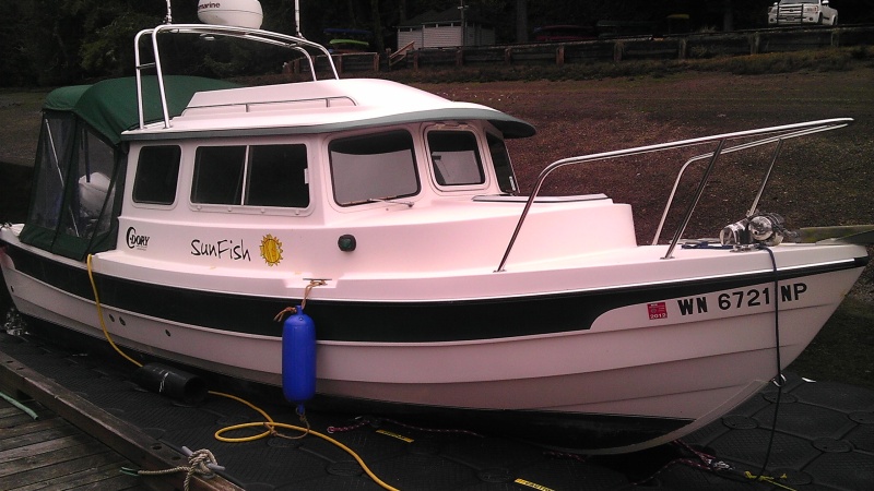 CD-22 High Top Cruiser, with Hi Top Bimini and Tall Radar Arch, New Lewmar Windlass - Re-powered 2+ yrs ago w New Honda 90 HP, less than 225 hrs. Boat set up by Les, Carl, Kathy at EQ Marine.