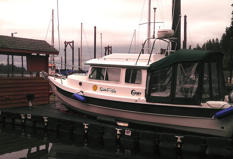 CDory 22 Classic On a Jet Dock   - drive on - z-pulley system & winch back boat till stern in water, then power off.