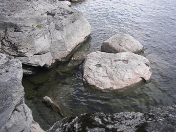 Climbing rocks at Valcour Island