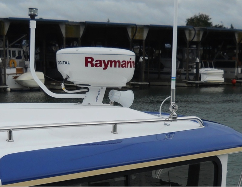 Close up of radar, post and light bar.  The radio antenna is very easily reached from helm window.