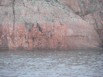Colorful rocks along small craft channel