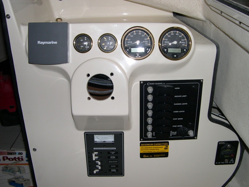 (DaveS) "Sea Shift" Instrument Panel with the dual System Check Commander Tachometers with Digital Fuel Flow Managers trimmed in Black/Gold. (3/9/04).