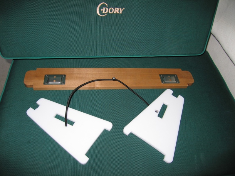 Dinette Table Cockpit Mounting 5.JPG 

Bungee cord makes it less likely to loose one of the pieces overboard.