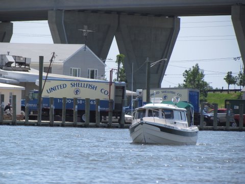 Dun Smith and his Cresent Girl. Kent Narrows provides a short cut to avoid having to go out and thru the Chesapeake Bay Bridge.