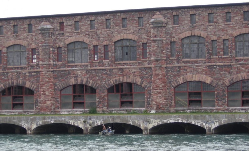 Edison Power Plant SSMarie Michigan..Fishing The Wall...think the bow of my  22 Classic Angler will fit inside the tunnel far enough for me to hook on to the wall.