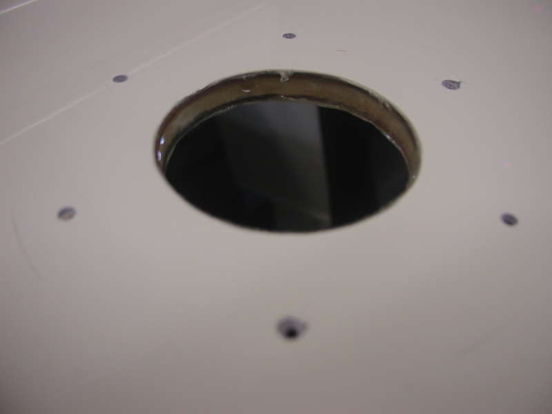 Exhaust 3" hole undercut and epoxied.