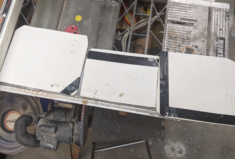 First We Cut Cardboard To Fit Windows
