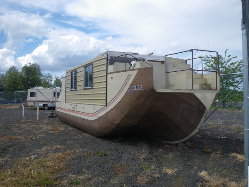 Found "The Ark", in a 2nd hand lot in NE Oregon.  It's not for sale, daughter thinks it might leak.  Home built, Steel hull.