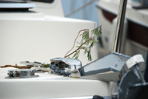 Greenery on the bow to ensure safe returns