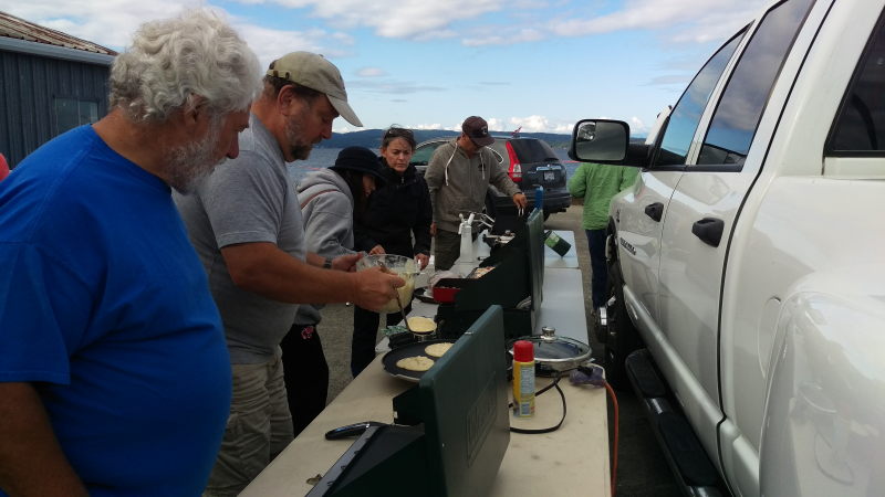 Harvey and Ron working the pancakes.