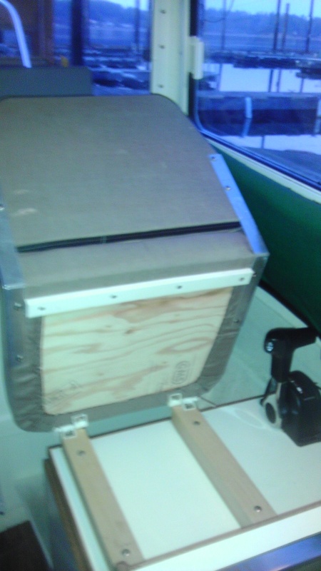 Helm seat folds forward, storage underneath.