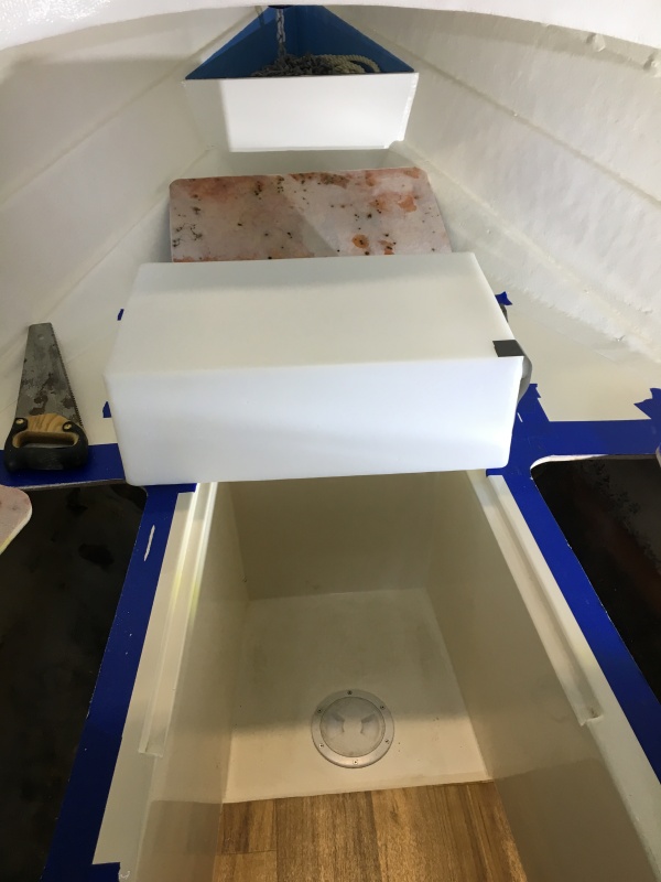Hole cut large enough for 12 gal water tank to fit in.