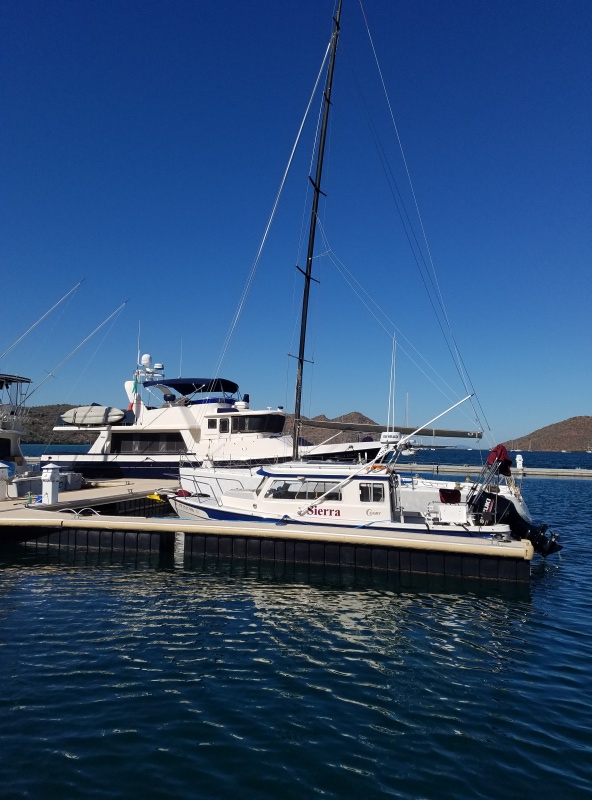 In with the big boys at Marina Escondido, off south to La Paz in a couple days, it is so nice here it\'s hard to leave it is the fanciest most modern, luxurious marina now with new owners that I have ever seen. As you can see plenty of room for more c-brats! They also launched Sierra with a tractor while we were aboard, then put the trailer in storage.
